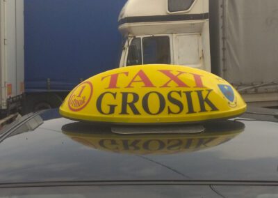 Reklama na taksówce.